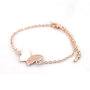 Armband vlinder rose/goud